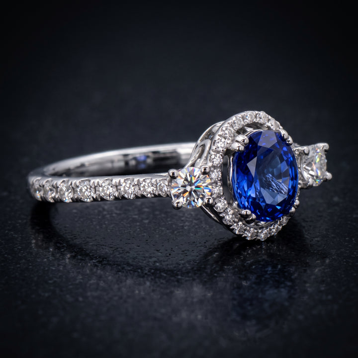 Stunning 14K Gold Oval Blue Sapphire Ring with Halo and Side Stones