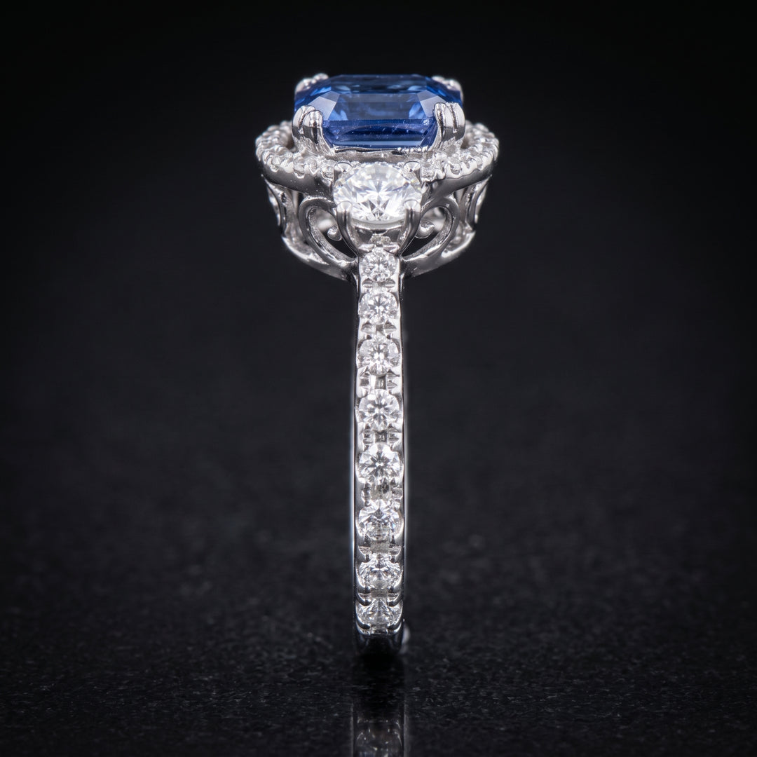 Stunning 14K Gold Oval Blue Sapphire Ring with Halo and Side Stones