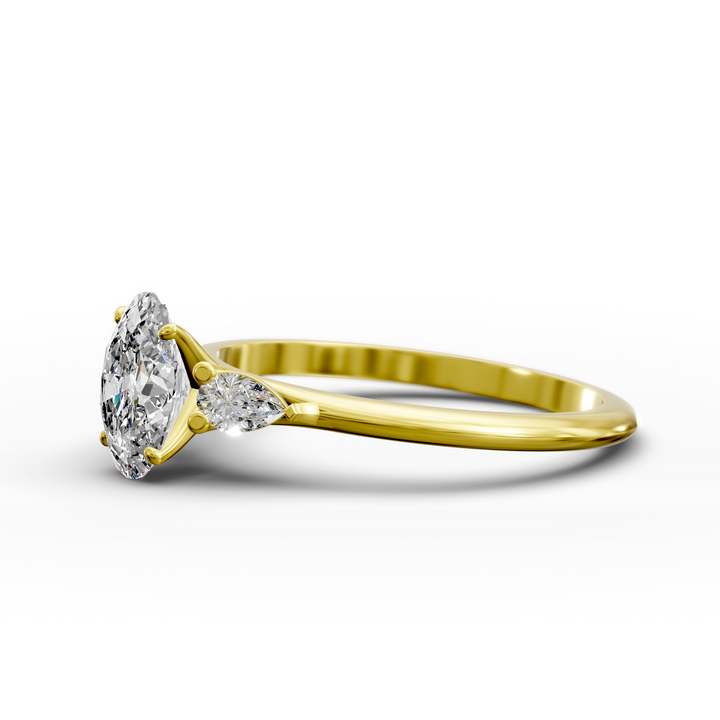 Oval three stone engagement ring with pear side diamonds on a slim band.