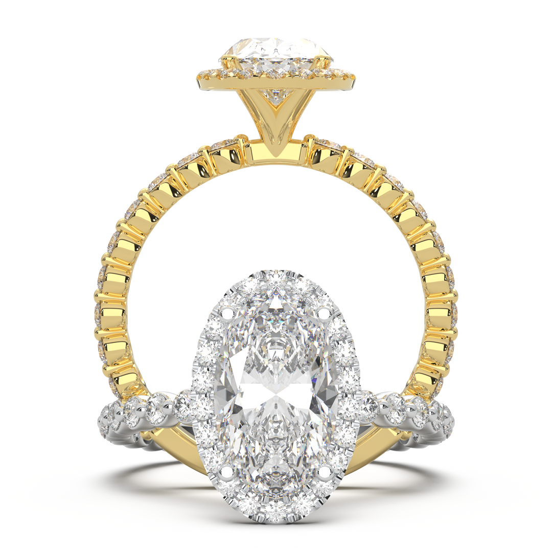 Oval lab-grown diamond ring with a halo and floating diamonds on the band.