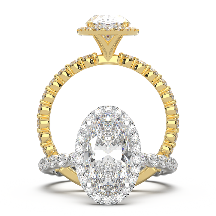 Oval lab-grown diamond ring with a halo and floating diamonds on the band.