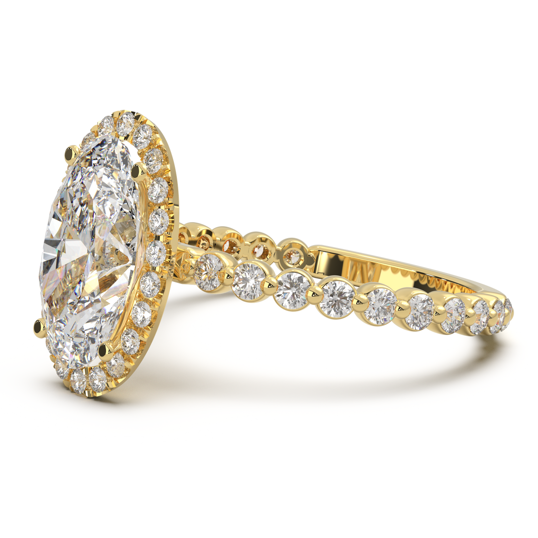 Oval lab-grown diamond ring with a halo and floating diamonds on the band.