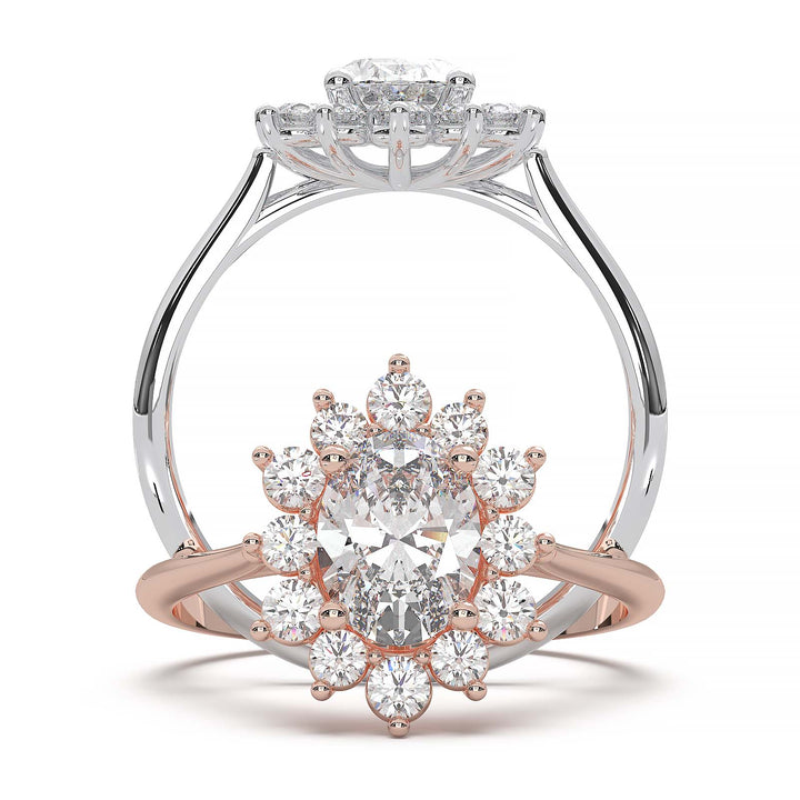 Oval lab-grown diamond ring with a sunburst halo of small diamonds in a low-profile setting.