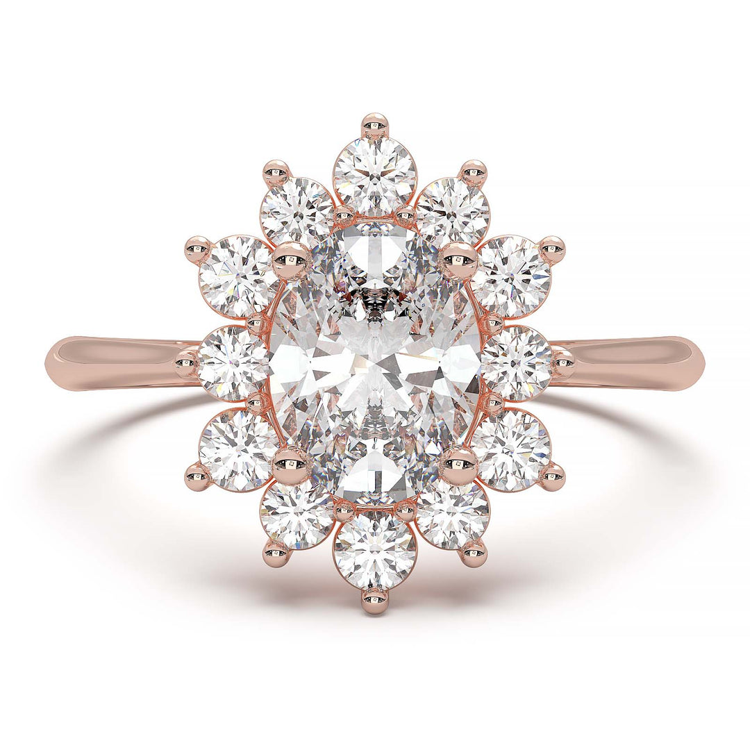 Oval lab-grown diamond ring with a sunburst halo of small diamonds in a low-profile setting.