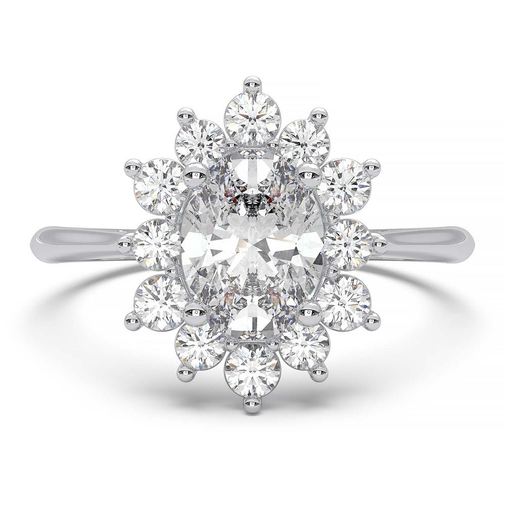 Oval lab-grown diamond ring with a sunburst halo of small diamonds in a low-profile setting.