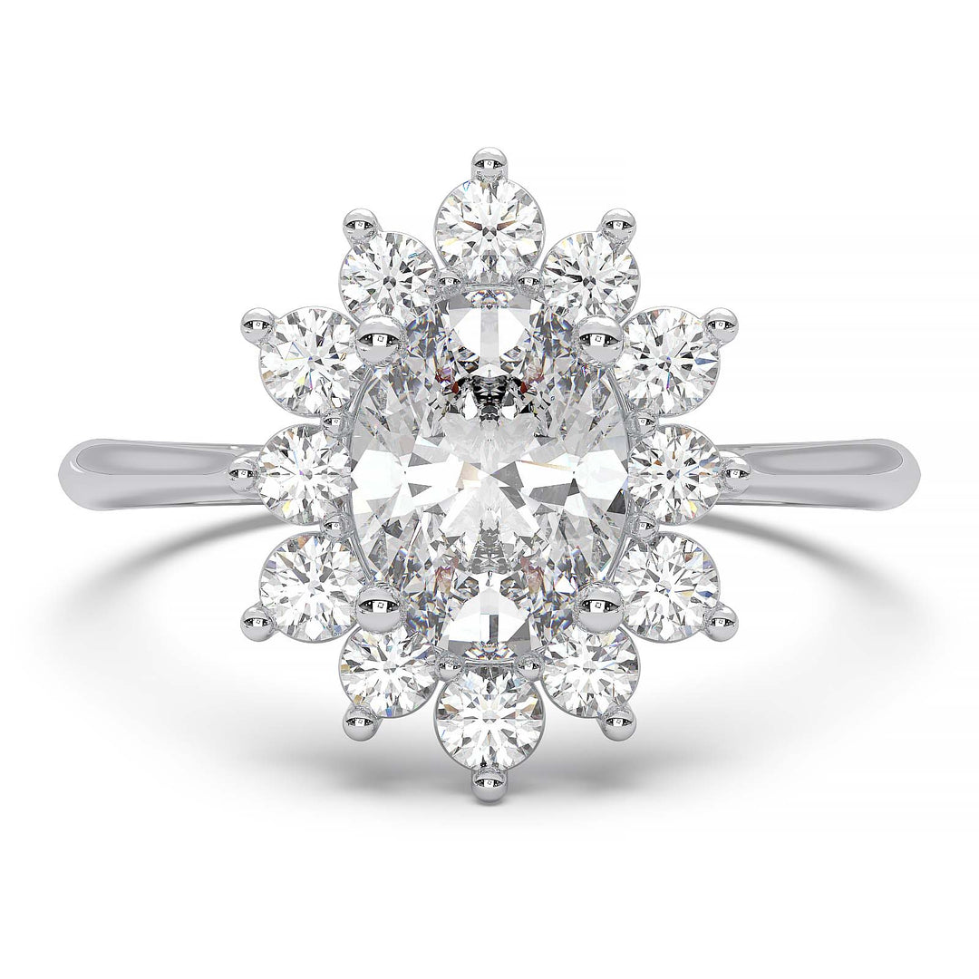 Oval lab-grown diamond ring with a sunburst halo of small diamonds in a low-profile setting.