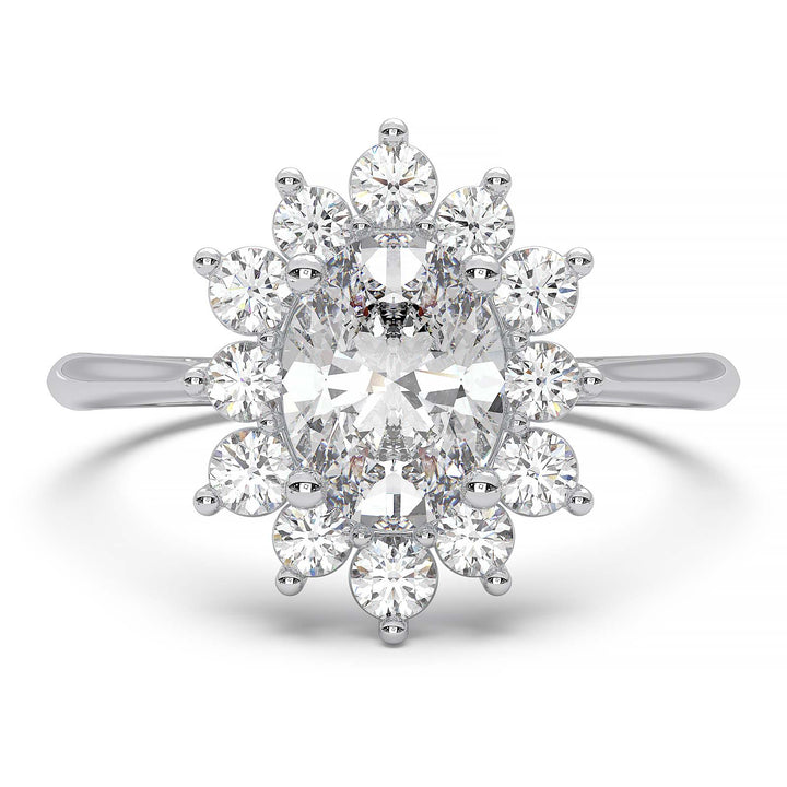 Oval lab-grown diamond ring with a sunburst halo of small diamonds in a low-profile setting.