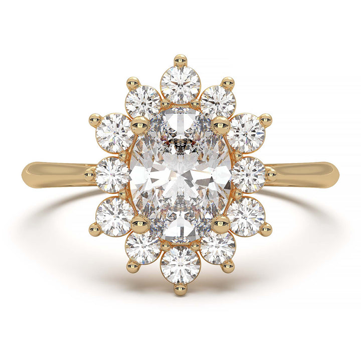 Oval lab-grown diamond ring with a sunburst halo of small diamonds in a low-profile setting.