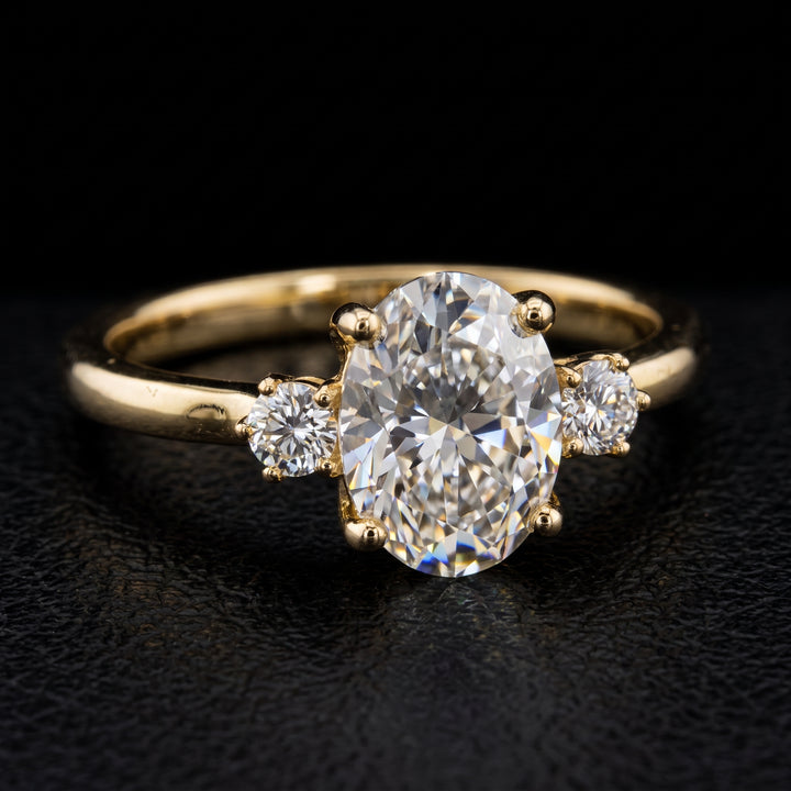 Oval Moissanite three stone engagement ring