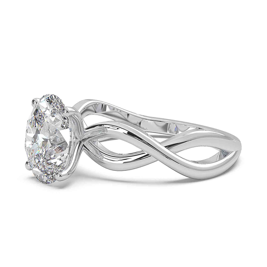 Oval lab-grown diamond ring with a twisted band and low-profile setting.