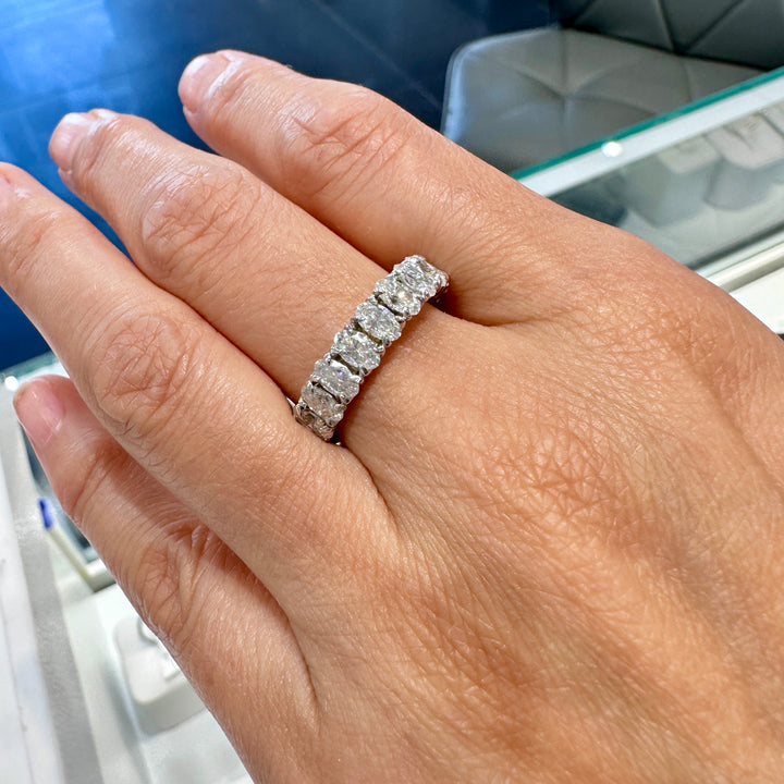 top-quality oval moissanite eternity band in 10k white gold