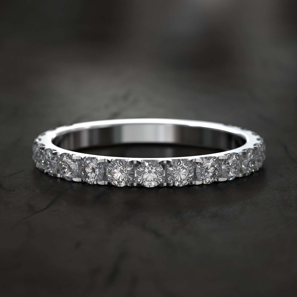 Partial eternity pavé diamond band with lab-grown diamonds set in gold or platinum, featuring 70% diamond coverage.