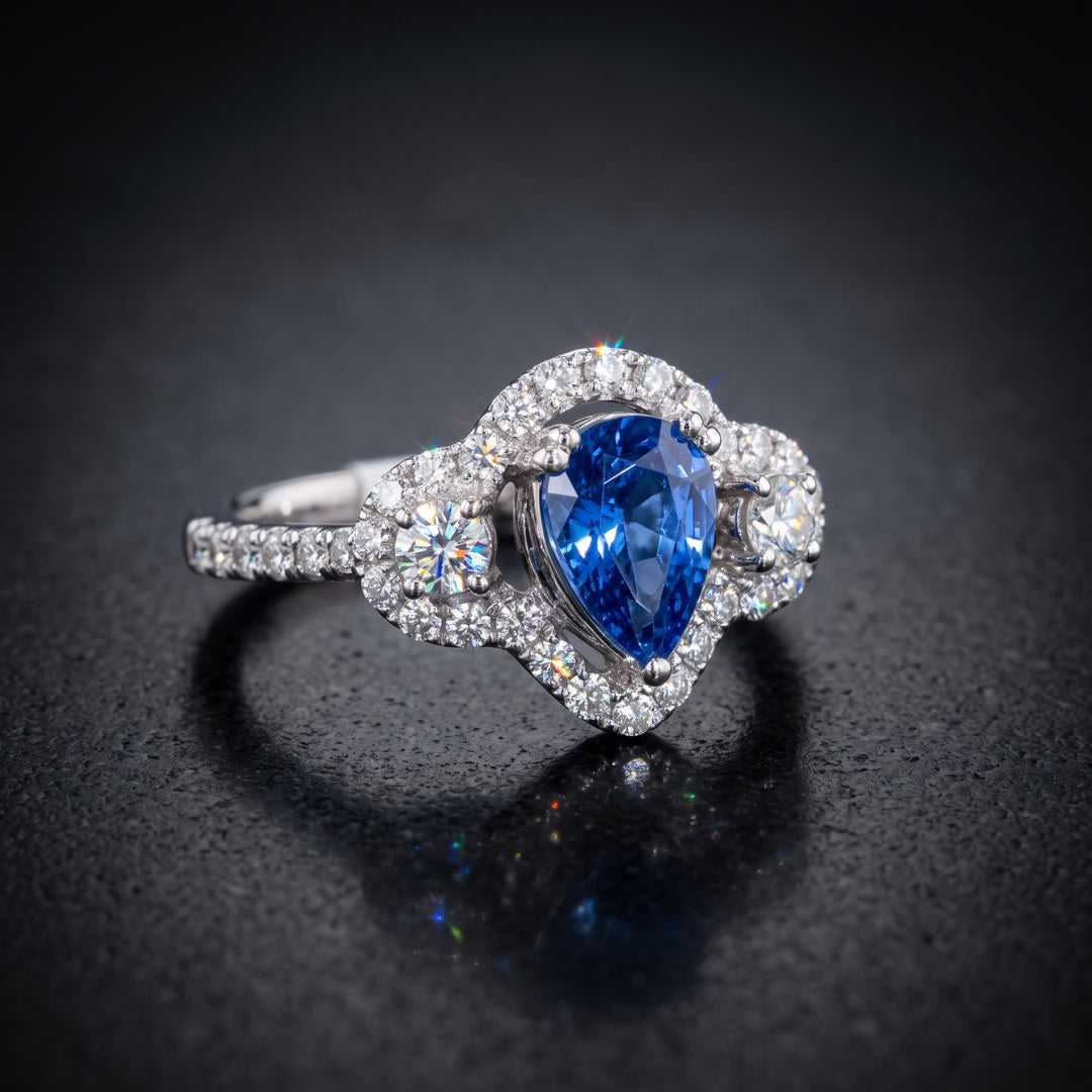 Dazzling 14K Gold Pear-Shaped Sapphire Ring with Halo and Side Diamonds