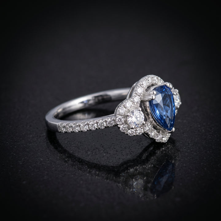 Dazzling 14K Gold Pear-Shaped Sapphire Ring with Halo and Side Diamonds