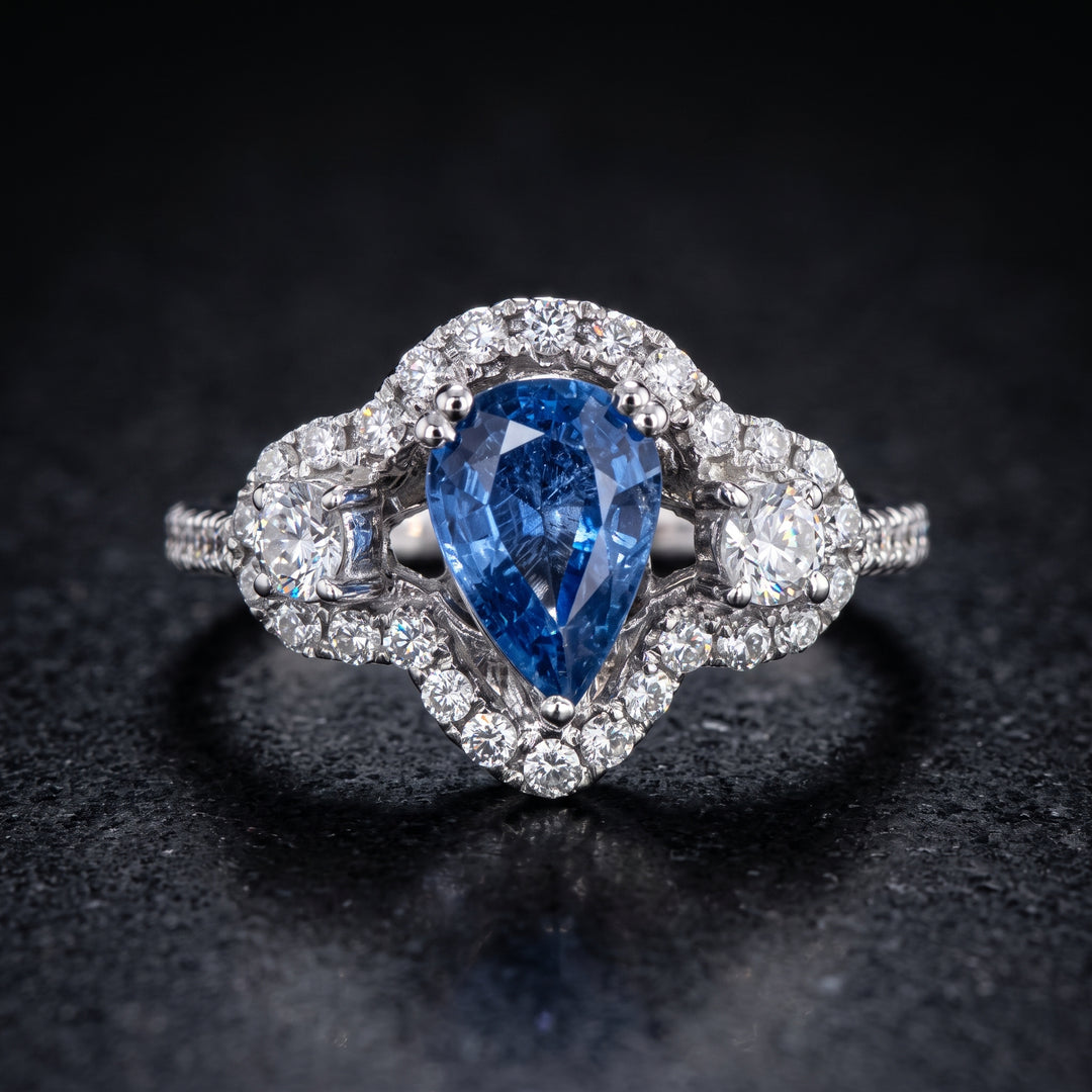 Dazzling 14K Gold Pear-Shaped Sapphire Ring with Halo and Side Diamonds