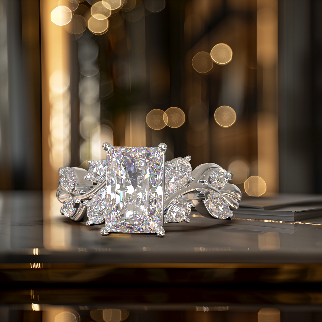 radiant diamond nature-inspired engagement ring with pear and marquise accents shown from multiple angles