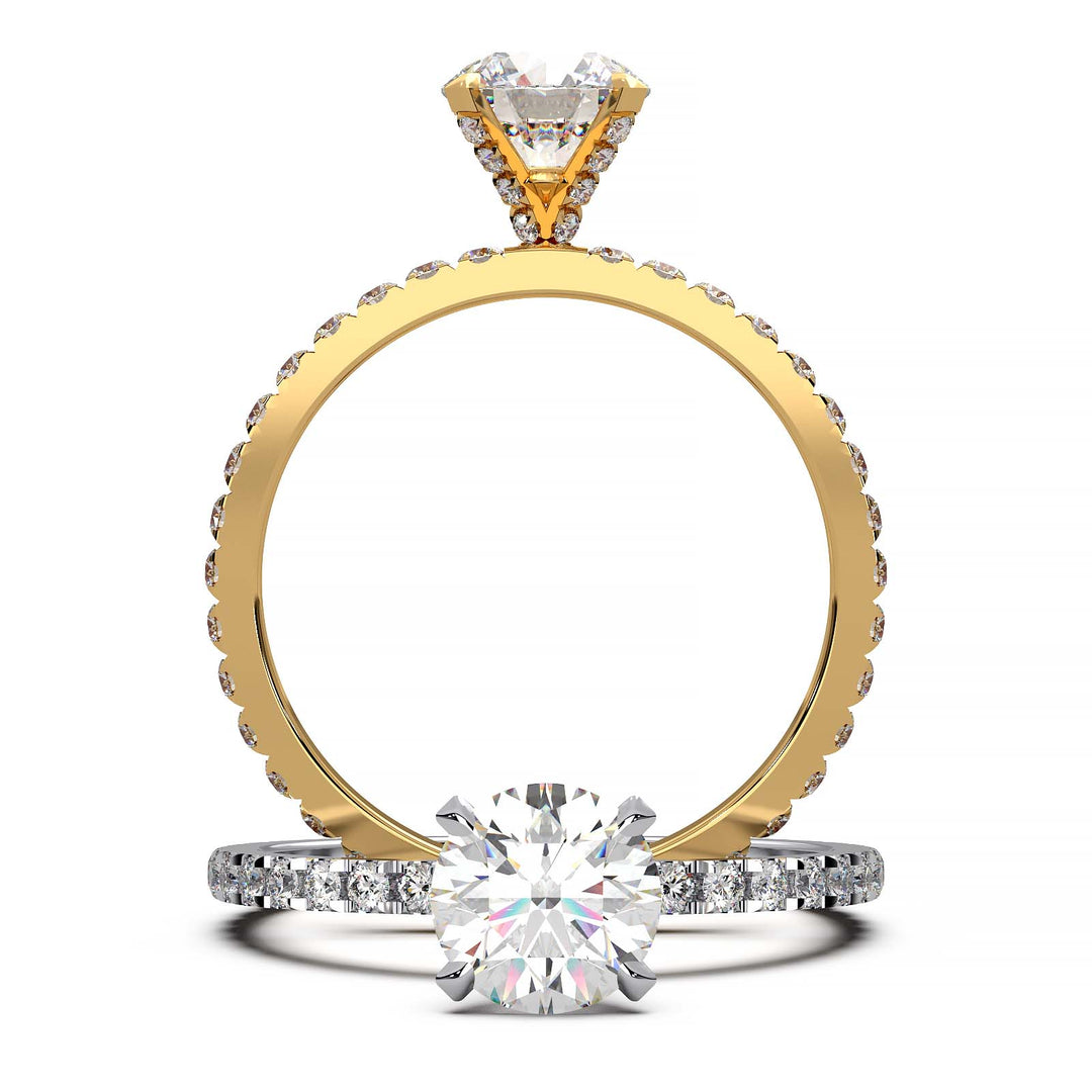 0.9 carat round lab-grown diamond engagement ring with pave-set diamonds on the band and additional small diamonds on prongs.