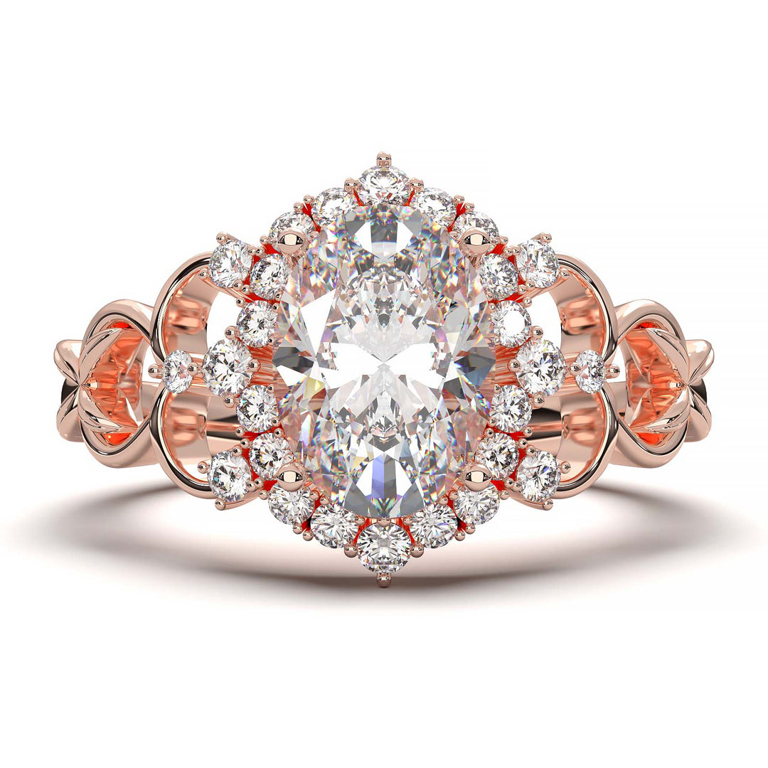 Oval-cut lab-grown diamond engagement ring with intricate vintage-inspired halo design and delicate band.