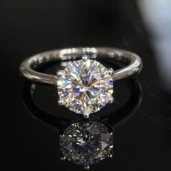 Round Moissanite Solitaire Ring, 14k gold.