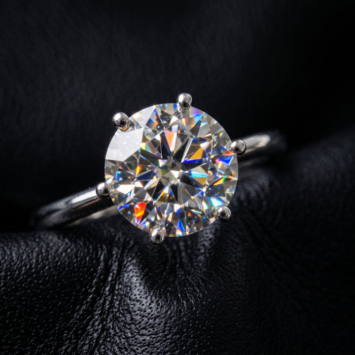 Round Moissanite Solitaire Ring, 14k gold.