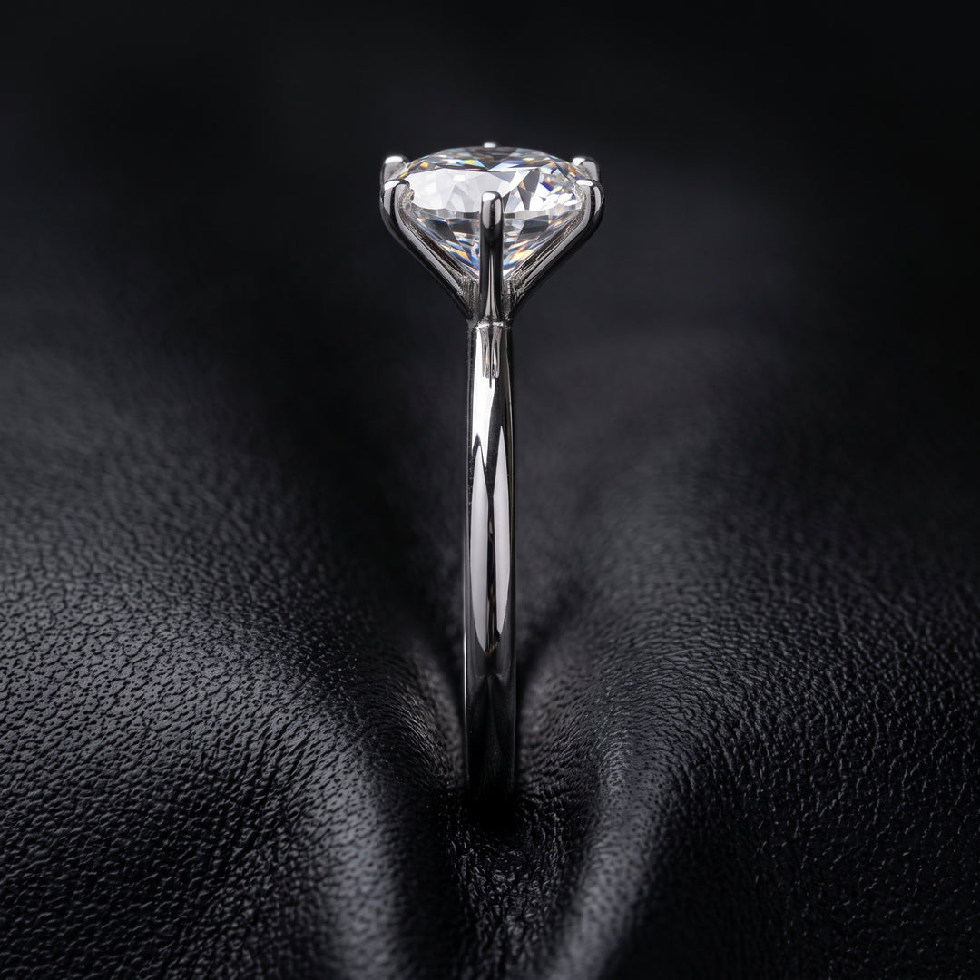 Round Moissanite Solitaire Ring, 14k gold.