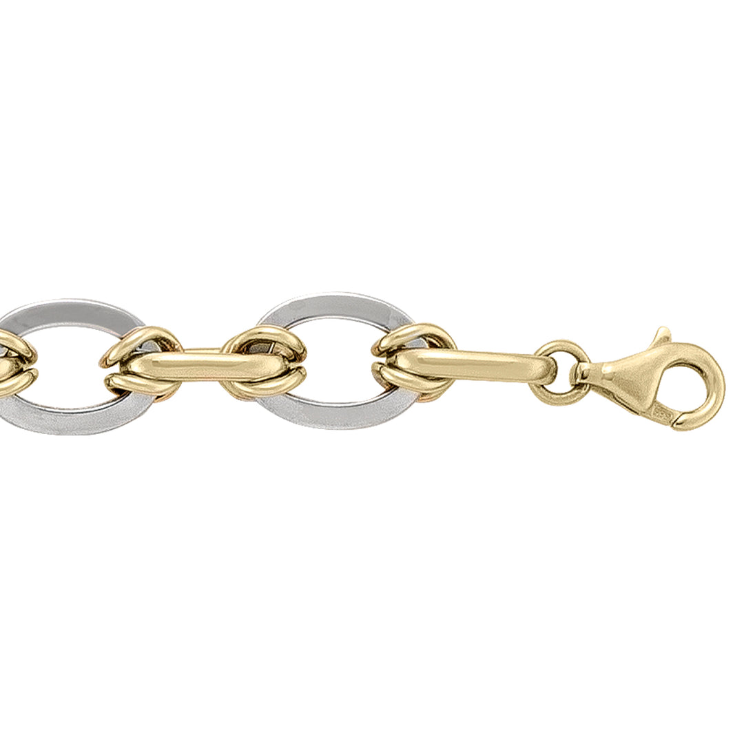 14k yellow and white gold bracelet with modern two-tone links and a lobster clasp, 7.25 inches long.