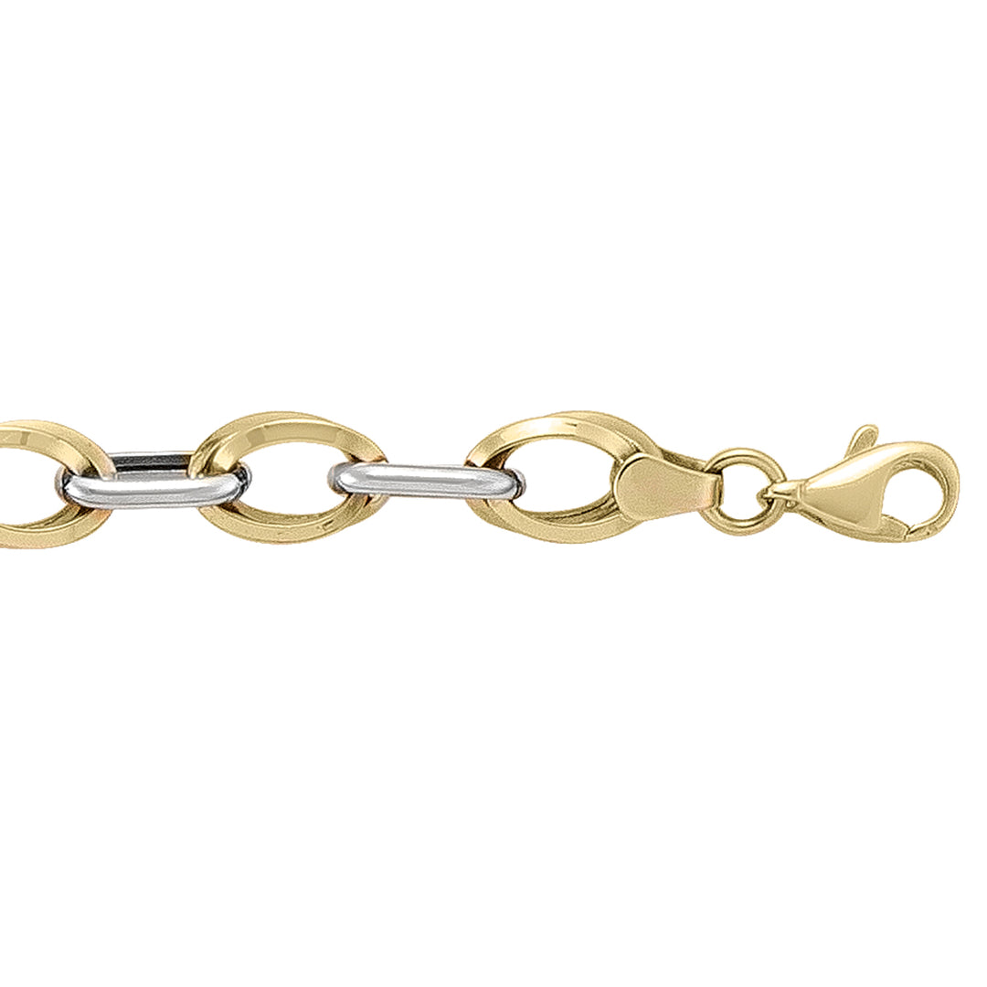 Two-tone 14k yellow and white gold hollow fancy bracelet with alternating oval links and lobster clasp.