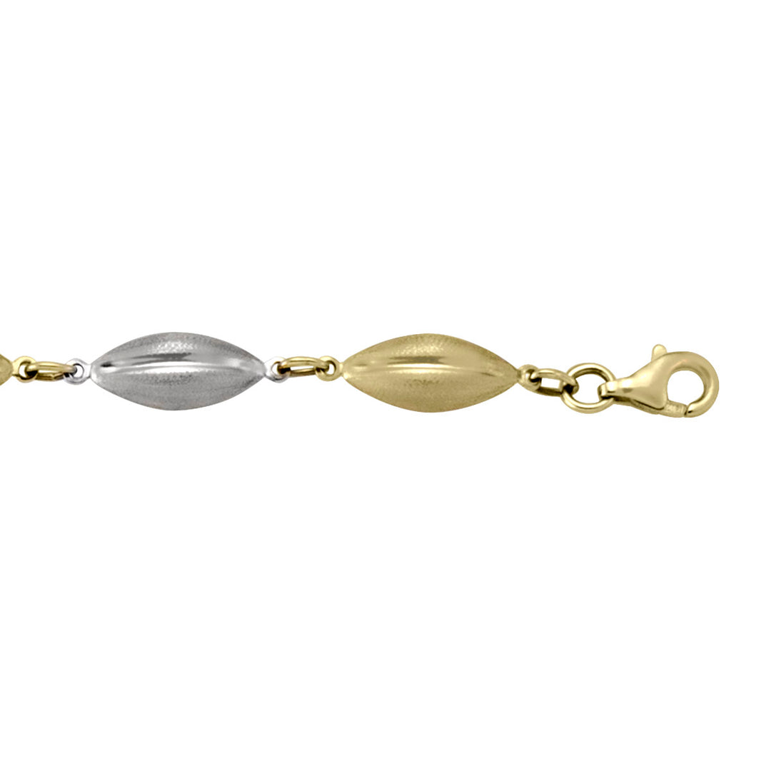 Two-tone gold bracelet with sleek hollow fancy links, featuring yellow and white gold, 7.25 inches long, 6.1 mm wide.