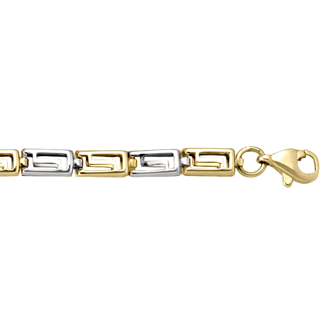 10k yellow and white gold bracelet with intricate two-tone links and a lobster clasp, 7.25 inches long.