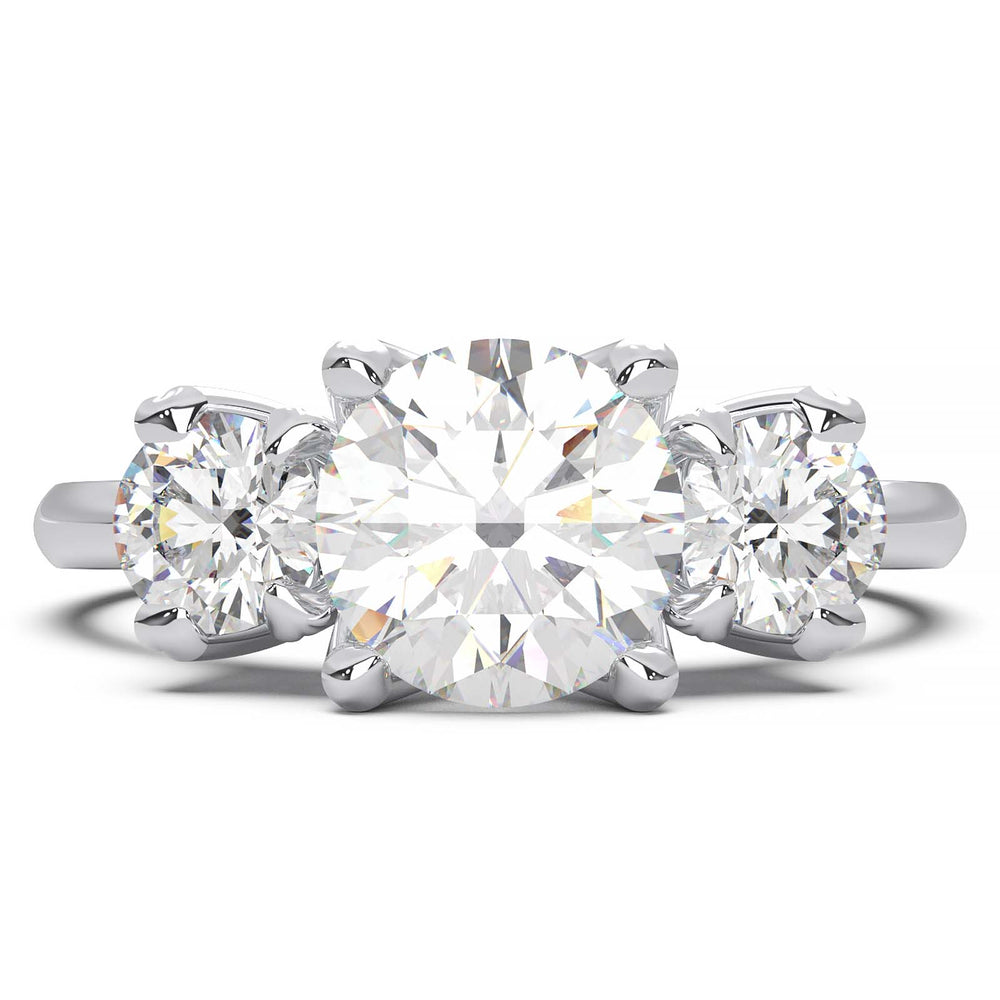 1-carat lab-grown diamond three-stone engagement ring with round-cut accents.