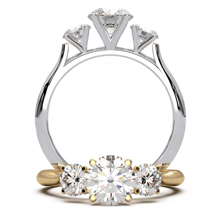 A cathedral-style three-stone diamond engagement ring featuring a central 0.5-carat round diamond, with two side diamonds in a gold or platinum band.