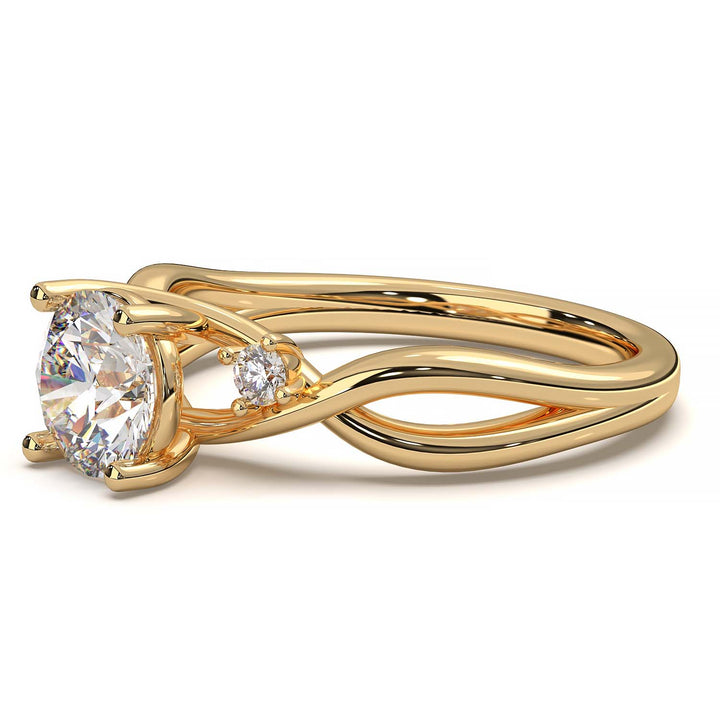 twisted engagement ring with a 0.8 carat round lab-grown diamond and two side lab-grown diamonds.