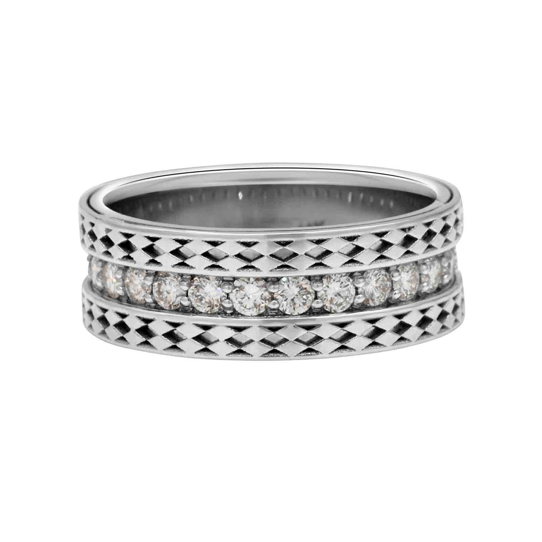 Close-up of a men's wedding band with natural diamonds and patterned sides in 14k white gold.