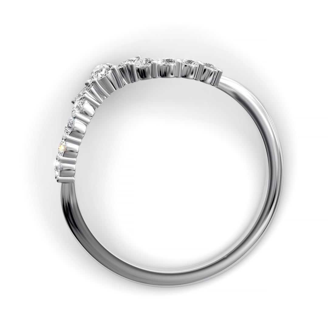 Curved V-shaped wedding band with pear center and side diamonds