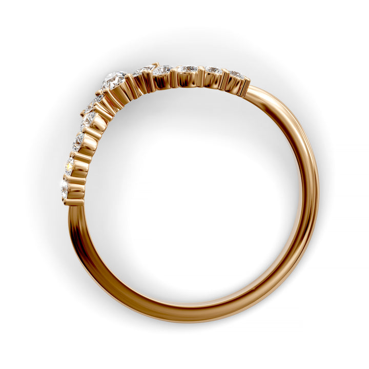 Curved V-shaped wedding band with pear center and side diamonds