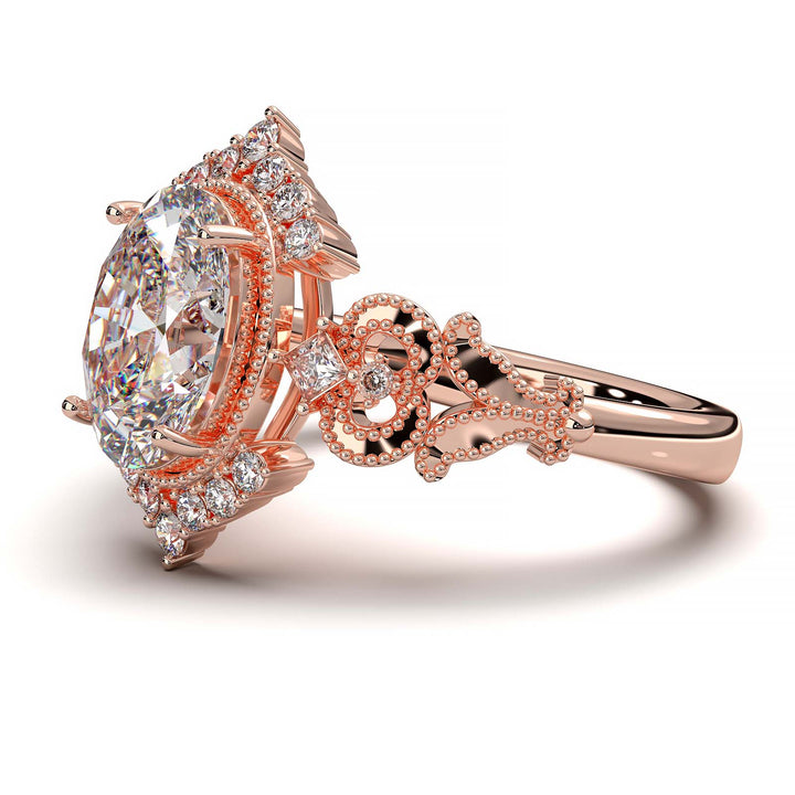 Vintage oval-cut diamond engagement ring with intricate filigree and smaller lab-grown diamonds.