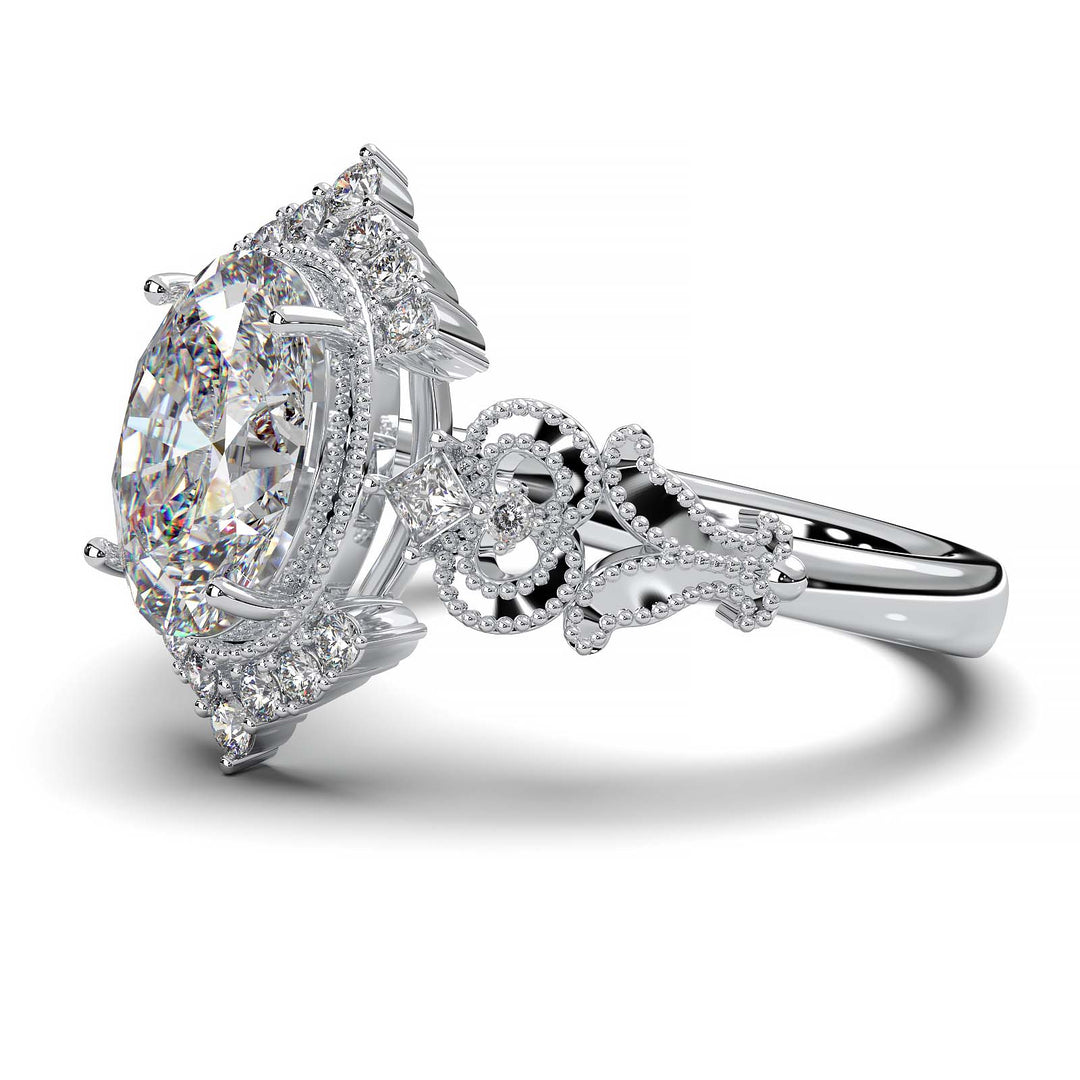 Vintage oval-cut diamond engagement ring with intricate filigree and smaller lab-grown diamonds.