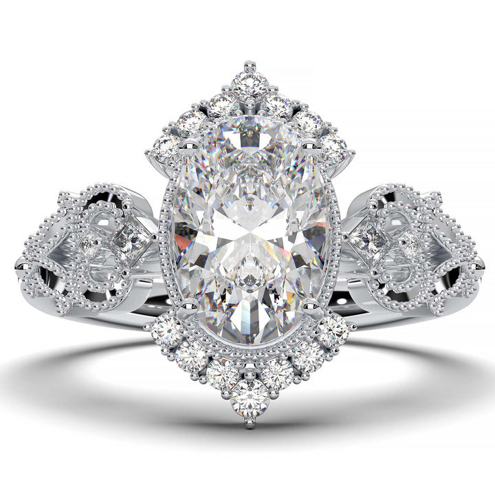 Vintage oval-cut diamond engagement ring with intricate filigree and smaller lab-grown diamonds.