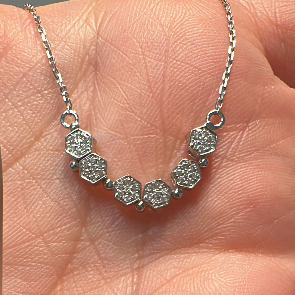 18K white gold necklace with 0.15 Ct natural pavé-set diamonds in a convertible hexagon design.