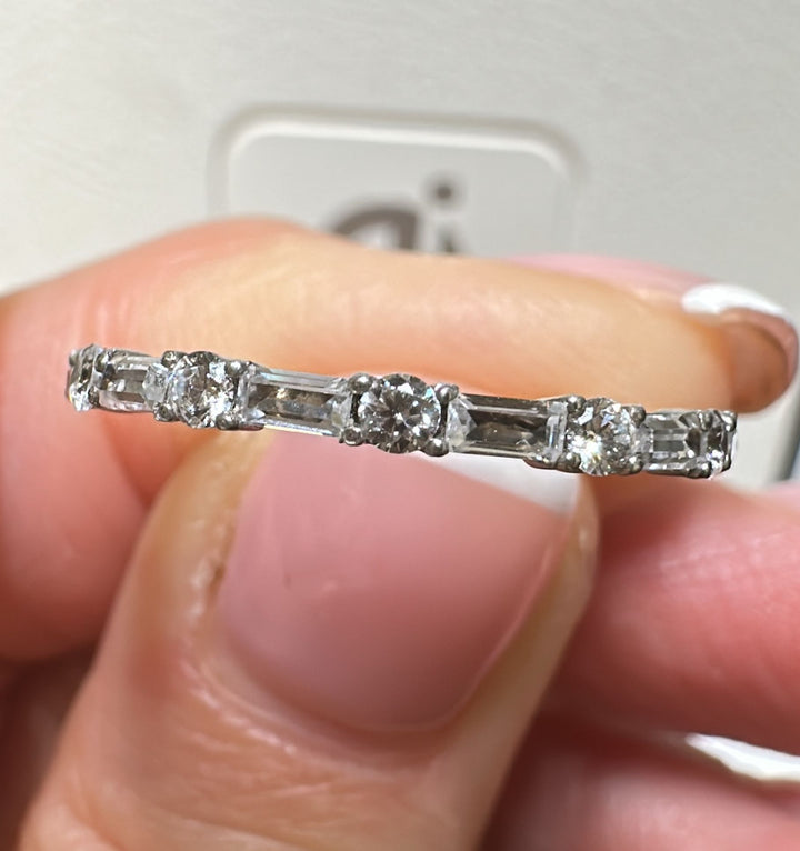 Moissanite wedding band in 14K/18K gold or platinum with alternating baguette and round stones.