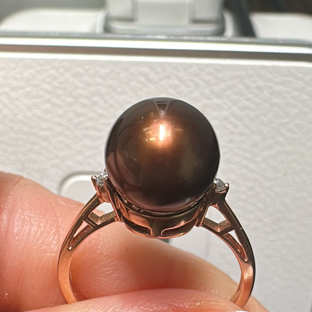 9.9mm Tahitian brown pearl ring in 14K rose gold with two small diamonds.