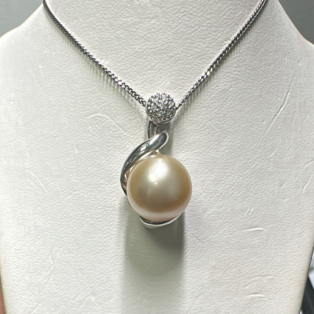 12mm Golden South Sea pearl pendant in 14K white gold with diamond accents.