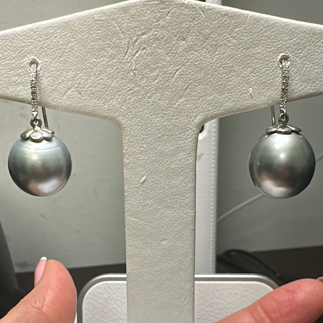 14.6mm AA round Tahitian pearl earrings in 14K white gold with diamond accents.