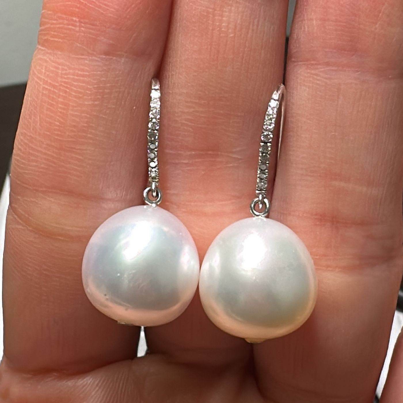 13.5mm South Sea white pearl earrings in 14K white gold with real diamonds.