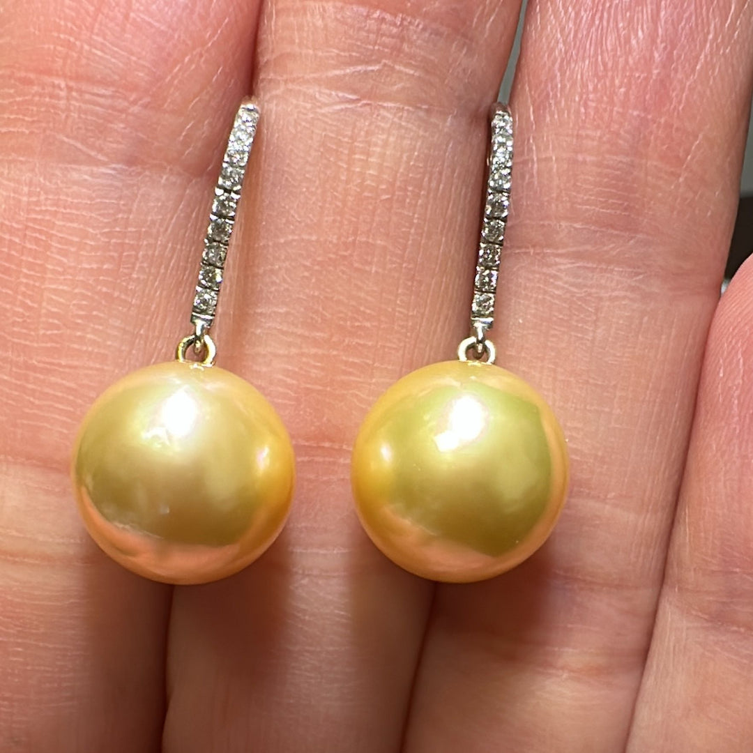 11.8mm AAA Golden South Sea pearl earrings in 14K white gold with diamond accents.