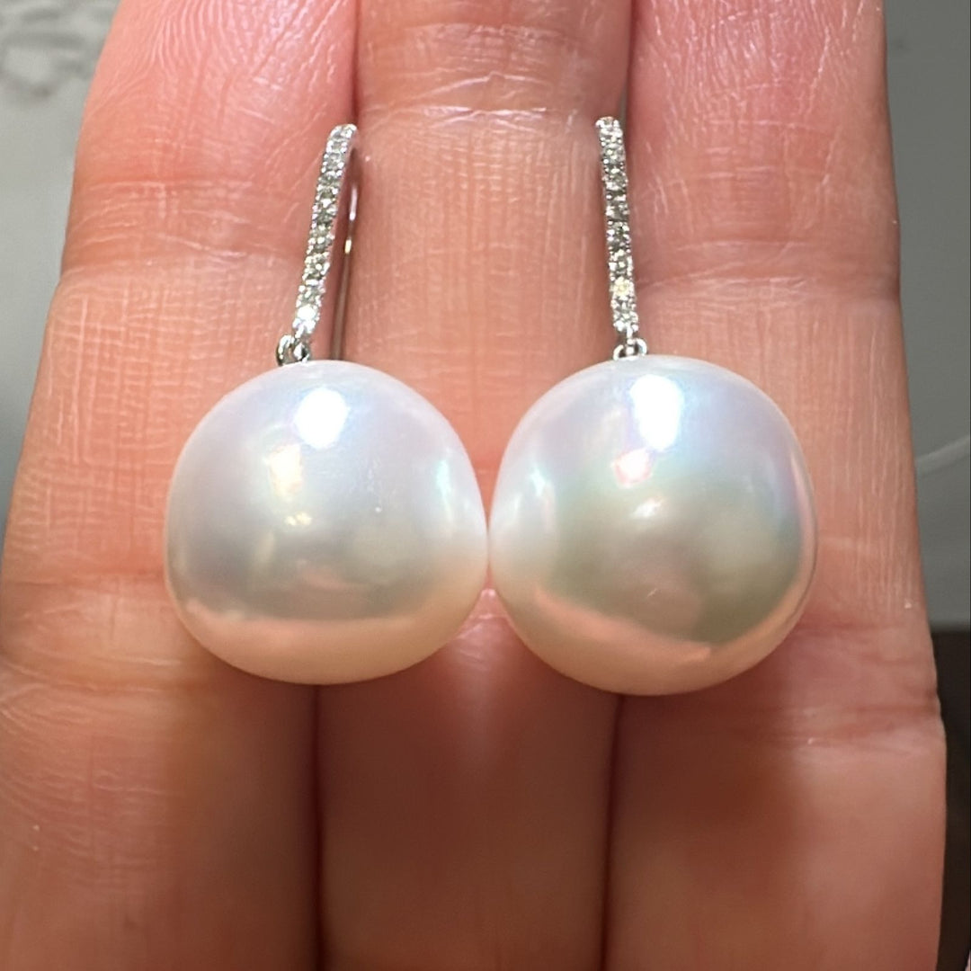 15.5mm rare White South Sea pearl earrings in 14K white gold with diamond accents.