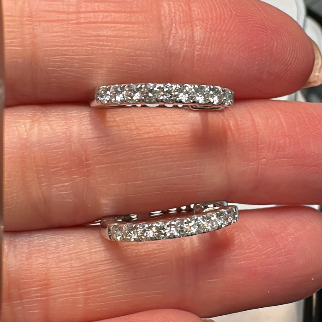 0.57 CT natural diamond hoop earrings in 18K white gold with VS-SI clarity.