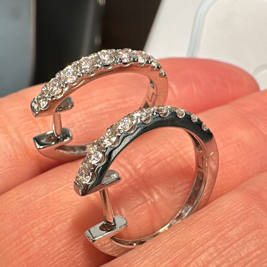 0.57 CT natural diamond hoop earrings in 18K white gold with VS-SI clarity.