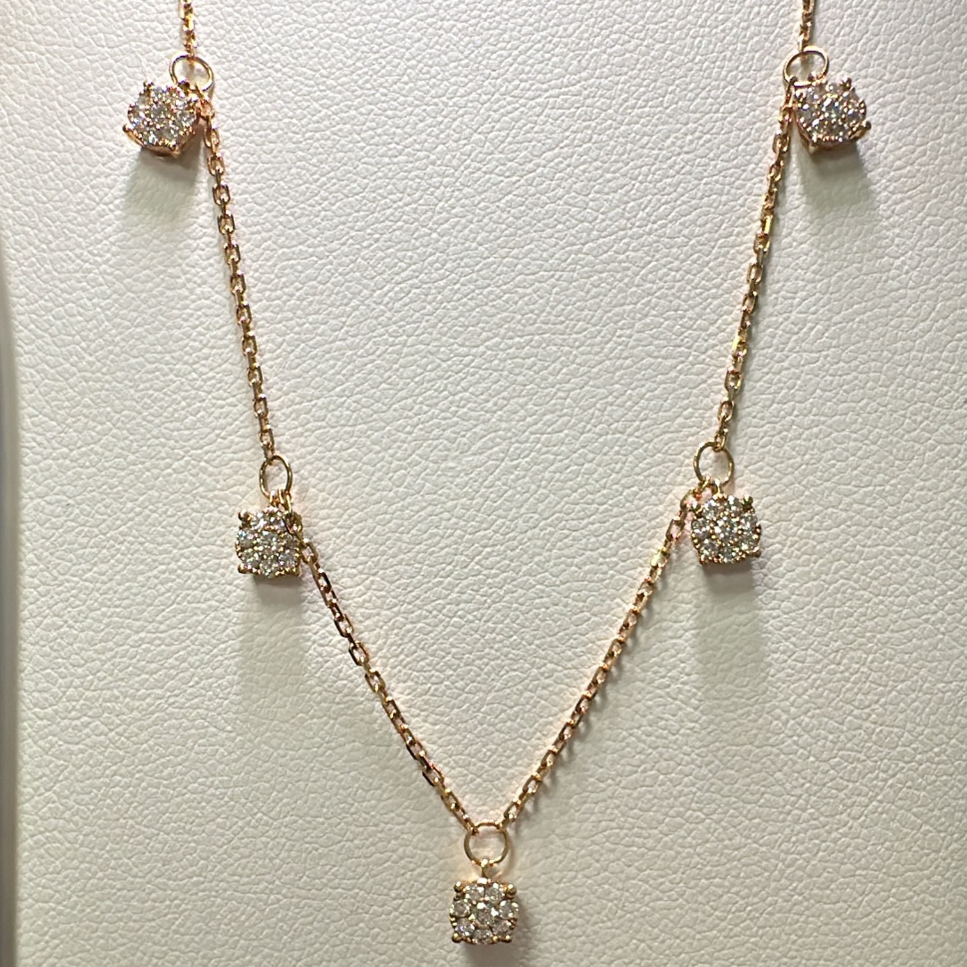 18K rose gold necklace with five diamond clusters, featuring 0.41 ct natural diamonds.