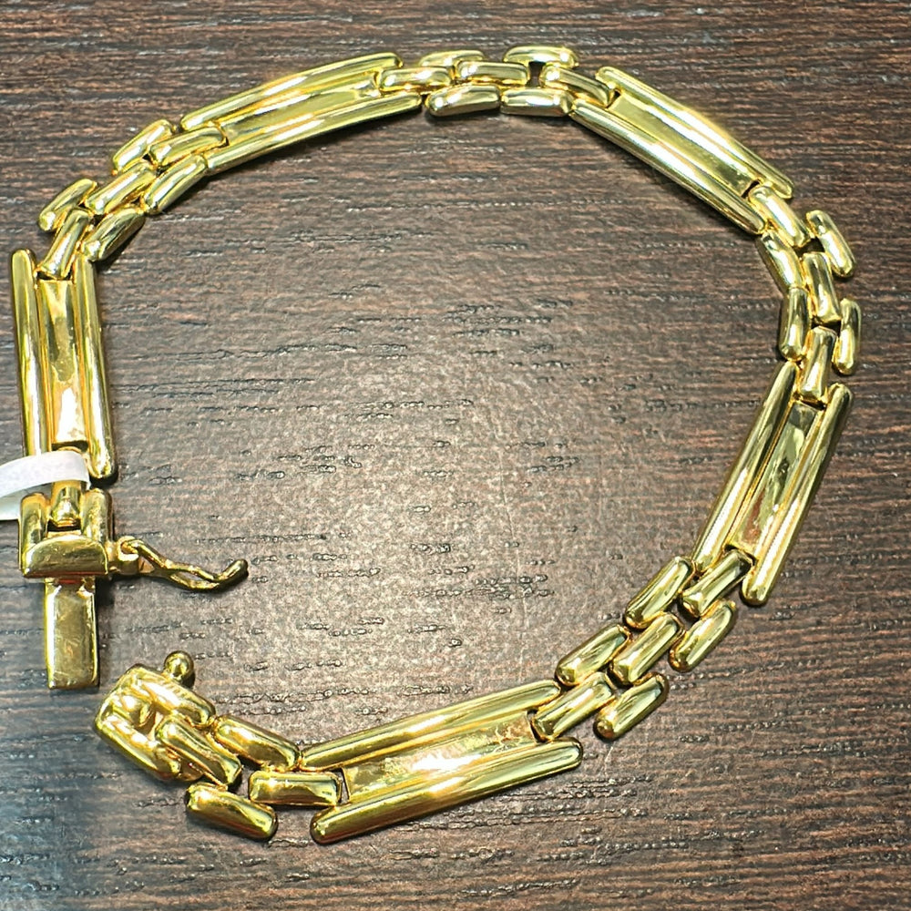 14K yellow gold polished link bracelet, 6.39mm width, 6.85g weight, with a box clasp.